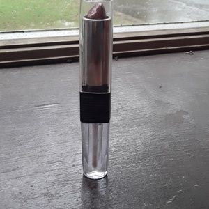 A WetnWild makeup  brush one lip gloss and a duo